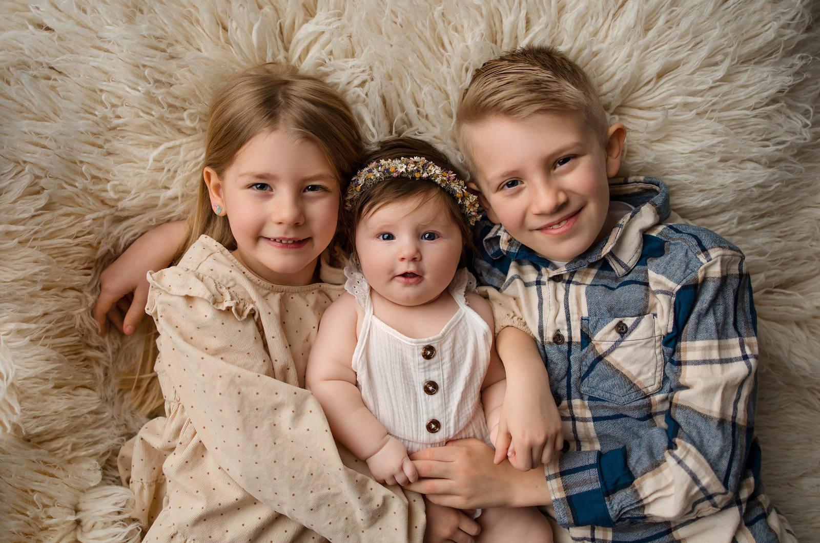 baby with siblings portrait