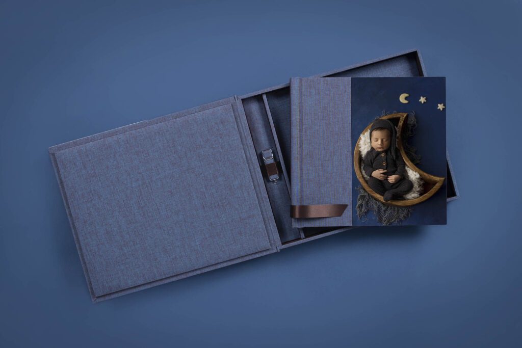 newborn photo on album