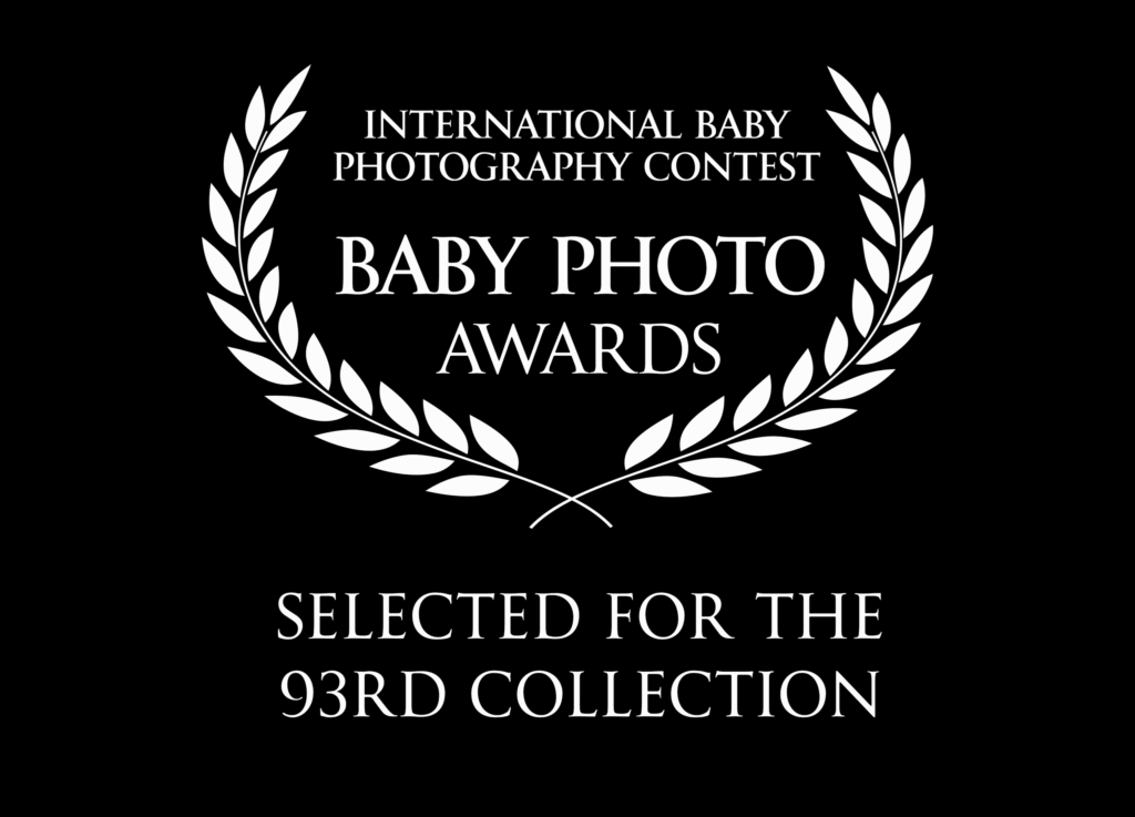 Black background with white laurel branches framing the text: "International Baby Photography Contest Baby Photo Awards. Selected for the 93rd Collection." Perfect for a Scottsdale maternity photographer’s portfolio.